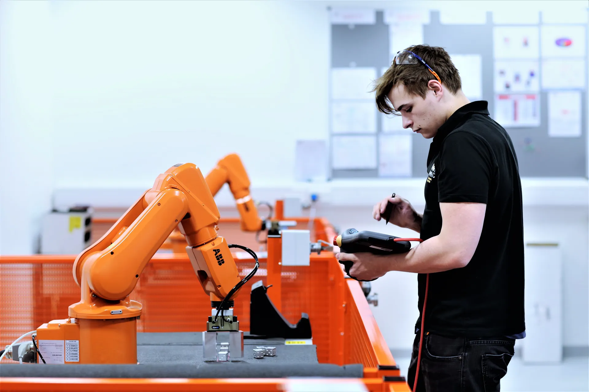 Worker with robotic arms background